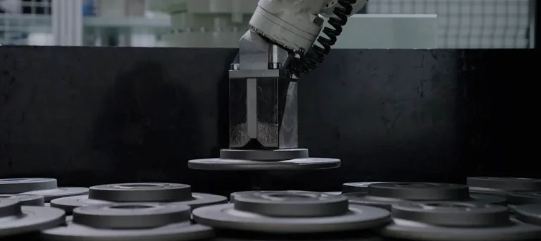 Photoneo 3D Vision Powers High-Speed Bin Picking of Heavy Brake Discs for Leading Italian Foundry